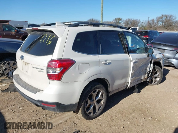 2016 Subaru Forester 2.5i Touring with VIN JF2SJAVC7GH404943, listed as a IAAI auction lot 41246088 with 157,913 mi miles. Bid and sale history available at carsss.com. Image 4.