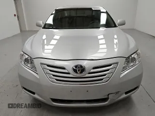 2009 Toyota Camry LE z VIN 4T1BK46K89U595880, wystawiony jako Copart lot #55069935 z przebiegiem 265 831 mil mil oraz Czysty tytuł • Clean title. Historia ofert i sprzedaży dostępna na DreamBid. Obrazek 5.