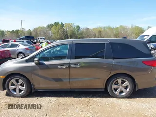 2020 Honda Odyssey EX with VIN 5FNRL6H59LB068868, listed as a IAAI auction lot 41930832 with 64,872 mi miles and . Bid and sale history available at DreamBid. Image 14.