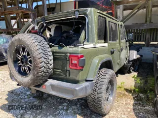 2024 Jeep Wrangler Sahara with VIN 1C4PJXEN8RW116985, listed as a Copart auction lot 56530875 with Not provided miles and Salvage title. Bid and sale history available at DreamBid. Image 4.