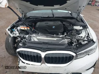 2022 BMW 3 Series 330i with VIN 3MW5R1J01N8C59980, listed as a IAAI auction lot 41445673 with 33,117 mi miles. Bid and sale history available at carsss.com. Image 10.