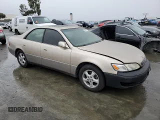 1999 Lexus ES 300 Luxury Sport Sdn with VIN JT8BF28G6X0170859, listed as a Copart auction lot 86406124 with 0 mi miles and Salvage Title. Bid and sale history available at carsss.com. Image 4.