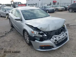 2009 Volkswagen CC Sport with VIN WVWNL73C69E548158, listed as a IAAI auction lot 41872972 with 127,468 mi miles. Bid and sale history available at carsss.com. Image 1.