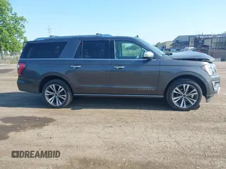 2021 Ford Expedition Max Platinum with VIN 1FMJK1MT8MEA66311, listed as a IAAI auction lot 42450429 with 95,732 mi miles and . Bid and sale history available at DreamBid. Image 13.