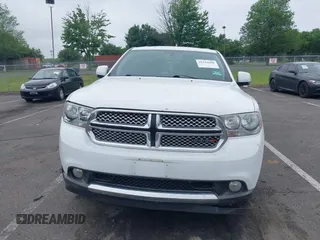 2013 Dodge Durango Crew with VIN 1C4RDJDG4DC518156, listed as a IAAI auction lot 42516880 with 162,402 mi miles and . Bid and sale history available at DreamBid. Image 12.