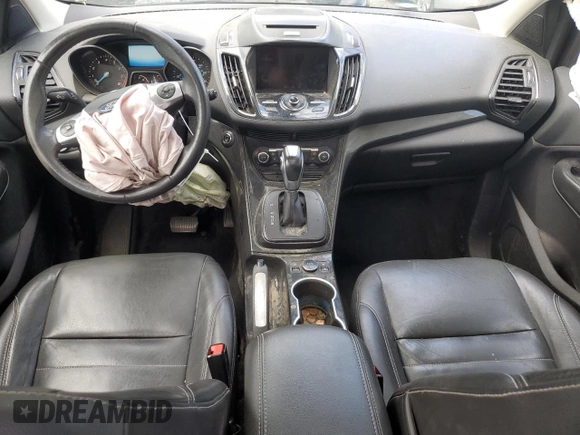 2016 Ford Escape Titanium with VIN 1FMCU9JX8GUB85463, listed as a Copart auction lot 58013684 with 147,620 mi miles and Salvage Title. Bid and sale history available at carsss.com. Image 8.