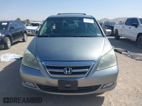 2005 Honda Odyssey Touring с VIN 5FNRL38895B083236, выставлен на аукционе IAAI как лот 42043046 с пробегом 205 141 миль миль и . История ставок и продаж доступна на DreamBid. Изображение 12.