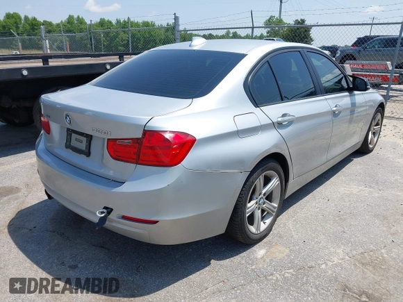 2013 BMW 3 Series 328i xDrive with VIN WBA3B3C52DJ975970, listed as a IAAI auction lot 42280624 with 2,262,225 mi miles and . Bid and sale history available at DreamBid. Image 4.
