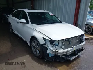 2018 Honda Accord Touring with VIN 1HGCV1F95JA184150, listed as a IAAI auction lot 42512012 with 38,094 mi miles and . Bid and sale history available at DreamBid. Image 1.