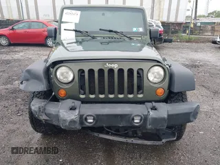 2007 Jeep Wrangler Unlimited X with VIN 1J4GA39127L231378, listed as a IAAI auction lot 42252475 with 152,568 mi miles and . Bid and sale history available at DreamBid. Image 13.
