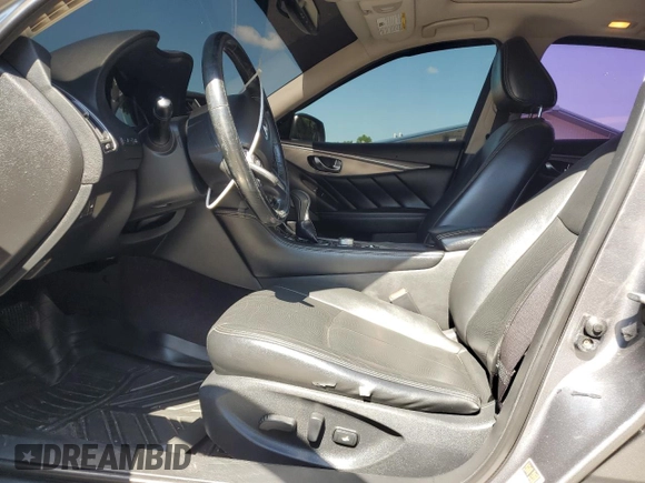 2015 Infiniti Q50 Premium z VIN JN1BV7ARXFM391291, wystawiony jako Copart lot #61765885 z przebiegiem 129 617 mil mil oraz Szkoda całkowita • Salvage title. Historia ofert i sprzedaży dostępna na DreamBid. Obrazek 7.