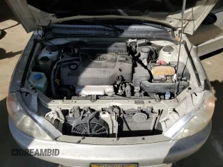 2002 Kia Rio with VIN KNADC123326133077, listed as a Copart auction lot 52427975 with 105,357 mi miles and Salvage Title. Bid and sale history available at carsss.com. Image 11.