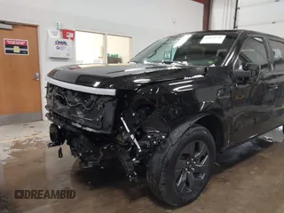 2023 Ford F-150 Lightning Pro with VIN 1FTVW1EV5PWG59228, listed as a IAAI auction lot 40838790 with Not Provided miles and . Bid and sale history available at DreamBid. Image 6.