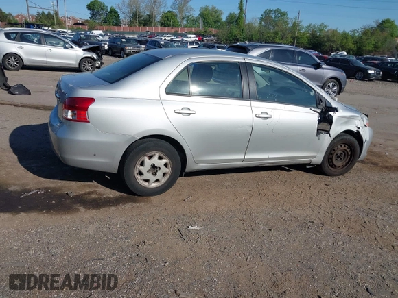 2009 Toyota Yaris with VIN JTDBT903891307874, listed as a IAAI auction lot 42150366 with 218,350 mi miles. Bid and sale history available at carsss.com. Image 4.
