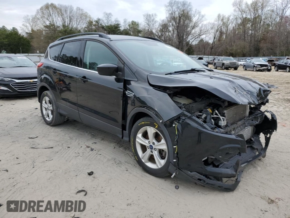 2016 Ford Escape SE with VIN 1FMCU9GX5GUB02417, listed as a Copart auction lot 51762985 with 97,535 mi miles and Salvage Title. Bid and sale history available at DreamBid. Image 4.