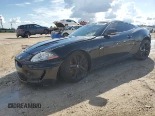 2010 Jaguar XK with VIN SAJWA4DC1AMB38762, listed as a Copart auction lot 73865884 with 98,030 mi miles and Salvage Title. Bid and sale history available at carsss.com. Image 1.