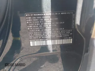 2018 Volkswagen Tiguan SEL z VIN 3VV2B7AX0JM047200, wystawiony jako IAAI lot #42221523 z przebiegiem 108 753 mil mil oraz . Historia ofert i sprzedaży dostępna na DreamBid. Obrazek 9.