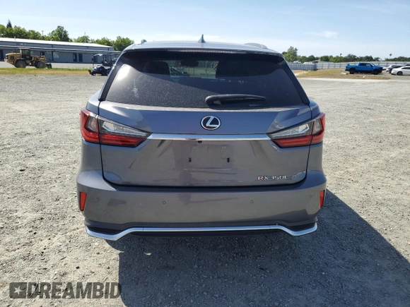 2020 Lexus RX 350L with VIN JTJHZKFA4L2027079, listed as a Copart auction lot 57151485 with 60,890 mi miles and Salvage title. Bid and sale history available at DreamBid. Image 6.