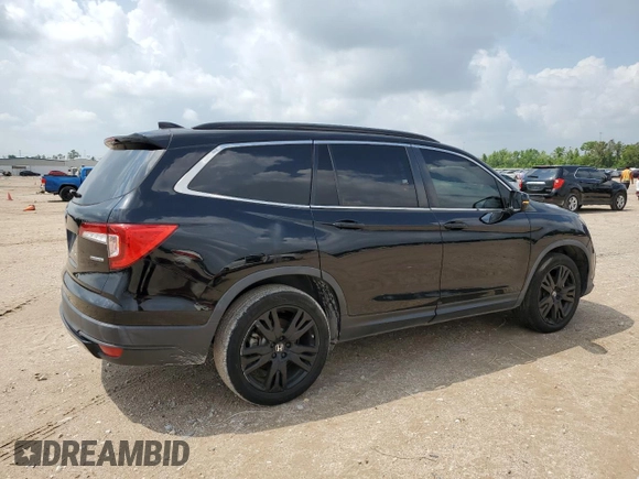 2021 Honda Pilot Special Edition with VIN 5FNYF5H29MB022140, listed as a Copart auction lot 54865815 with 87,294 mi miles and Salvage Title. Bid and sale history available at DreamBid. Image 3.