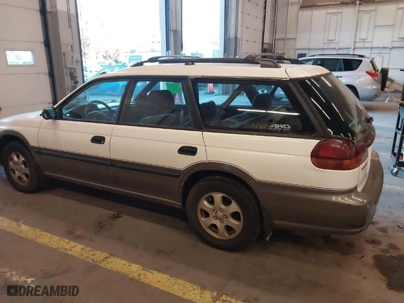 1999 Subaru Legacy Wagon Outback with VIN 4S3BG6852X7602214, listed as a IAAI auction lot 41429335 with 139,193 mi miles. Bid and sale history available at carsss.com. Image 6.