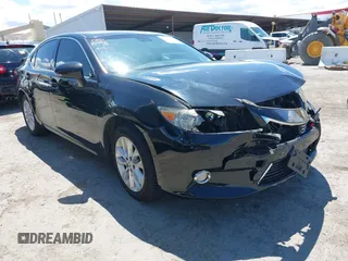 2013 Lexus ES 300h with VIN JTHBW1GG1D2034392, listed as a IAAI auction lot 42236596 with 207,830 mi miles and . Bid and sale history available at DreamBid. Image 1.