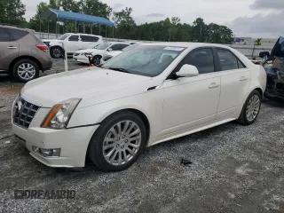2012 Cadillac CTS Premium with VIN 1G6DS5E35C0107306, listed as a Copart auction lot 57486615 with 149,012 mi miles and Salvage title. Bid and sale history available at DreamBid. Image 1.