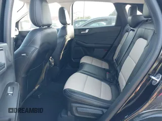 2021 Ford Escape Titanium Hybrid with VIN 1FMCU9DZ0MUB14833, listed as a IAAI auction lot 42593983 with 51,852 mi miles and . Bid and sale history available at DreamBid. Image 8.