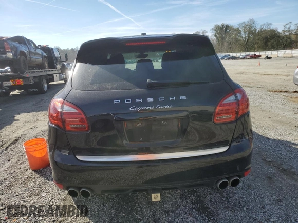 2012 Porsche Cayenne Turbo z VIN WP1AC2A2XCLA83901, wystawiony jako Copart lot #80627904 z przebiegiem 142 352 mil mil oraz Szkoda całkowita • Salvage title. Historia ofert i sprzedaży dostępna na DreamBid. Obrazek 6.