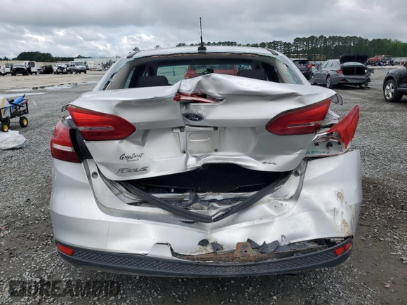 2016 Ford Focus SE with VIN 1FADP3F22GL402818, listed as a Copart auction lot 59500485 with 142,814 mi miles and Salvage title. Bid and sale history available at DreamBid. Image 6.