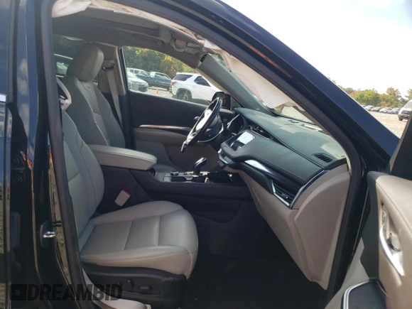 2023 Cadillac XT4 AWD Luxury with VIN 1GYFZBR49PF101377, listed as a Copart auction lot 73961294 with 26,847 mi miles and Salvage Title. Bid and sale history available at carsss.com. Image 7.