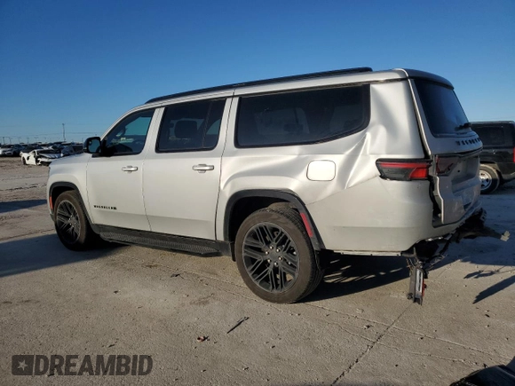 2024 Jeep Wagoneer Series II Carbide with VIN 1C4SJSBP8RS103079, listed as a Copart auction lot 47974685 with 15,990 mi miles and Salvage Title. Bid and sale history available at DreamBid. Image 2.
