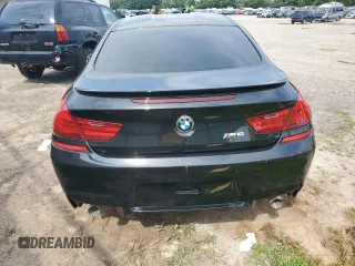 2014 BMW M6 z VIN WBSLX9C54ED160430, wystawiony jako Copart lot #66270794 z przebiegiem 92 025 mil mil oraz Szkoda całkowita • Salvage title. Historia ofert i sprzedaży dostępna na DreamBid. Obrazek 6.