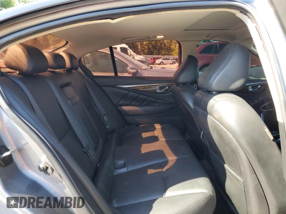 2019 Infiniti Q50 Luxe z VIN JN1EV7AP9KM515606, wystawiony jako Copart lot #53248805 z przebiegiem 100 081 mil mil oraz Nie do naprawy • Non repairable. Historia ofert i sprzedaży dostępna na DreamBid. Obrazek 10.