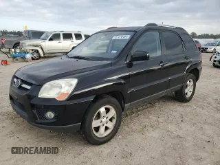 2009 Kia Sportage LX with VIN KNDJF723297612031, listed as a Copart auction lot 87476464 with 183,906 mi miles and Salvage Title. Bid and sale history available at carsss.com. Image 1.