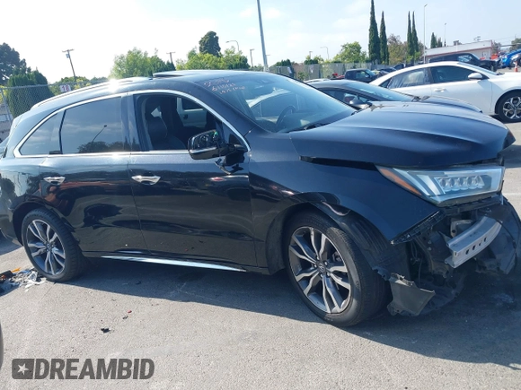 2019 Acura MDX Advance with VIN 5J8YD3H89KL001475, listed as a IAAI auction lot 42489400 with 100,281 mi miles and . Bid and sale history available at DreamBid. Image 14.