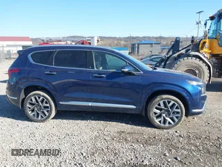 2021 Hyundai Santa Fe Calligraphy z VIN 5NMS5DAL4MH352689, wystawiony jako IAAI lot #41740911 z przebiegiem 15 589 mil mil oraz . Historia ofert i sprzedaży dostępna na DreamBid. Obrazek 13.