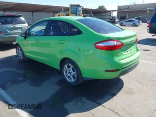 2015 Ford Fiesta SE with VIN 3FADP4BJ7FM211041, listed as a IAAI auction lot 41625903 with 135,532 mi miles. Bid and sale history available at carsss.com. Image 3.