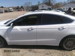 2016 Ford Fusion Titanium with VIN 3FA6P0K93GR331947, listed as a IAAI auction lot 41828409 with 181,555 mi miles and . Bid and sale history available at DreamBid. Image 14.