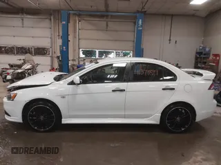 2014 Mitsubishi Lancer GT with VIN JA32U8FWXEU016230, listed as a IAAI auction lot 41379899 with 108,511 mi miles. Bid and sale history available at carsss.com. Image 14.