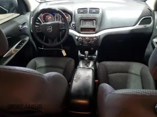 2013 Dodge Journey American Value with VIN 3C4PDCAB4DT581984, listed as a Copart auction lot 59953515 with 166,927 mi miles and Salvage title. Bid and sale history available at DreamBid. Image 8.