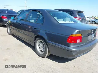 2000 BMW 5 Series 528iA with VIN WBADM6343YGV01651, listed as a IAAI auction lot 41745574 with 143,898 mi miles. Bid and sale history available at carsss.com. Image 3.