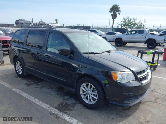 2014 Dodge Grand Caravan SXT 30th Anniversary with VIN 2C4RDGCG7ER122042, listed as a IAAI auction lot 41600892 with 101,596 mi miles. Bid and sale history available at carsss.com. Image 1.