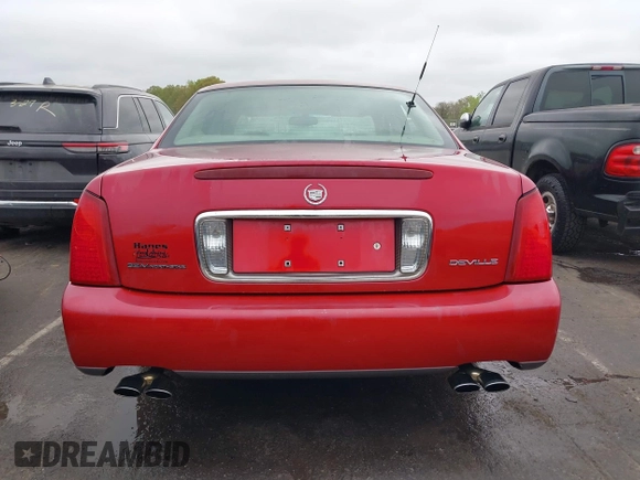 2002 Cadillac DeVille with VIN 1G6KD57YX2U257123, listed as a IAAI auction lot 41952025 with 180,278 mi miles. Bid and sale history available at carsss.com. Image 16.