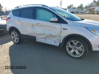 2019 Ford Escape Titanium with VIN 1FMCU9J91KUB21842, listed as a IAAI auction lot 41632210 with 104,900 mi miles. Bid and sale history available at carsss.com. Image 6.