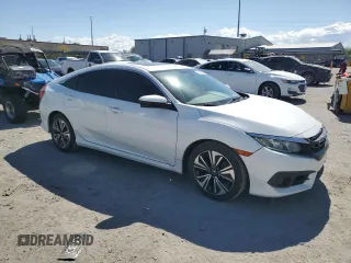 2016 Honda Civic EX-T z VIN 19XFC1F35GE029827, wystawiony jako Copart lot #55698325 z przebiegiem 108 297 mil mil oraz Szkoda całkowita • Salvage title. Historia ofert i sprzedaży dostępna na DreamBid. Obrazek 4.