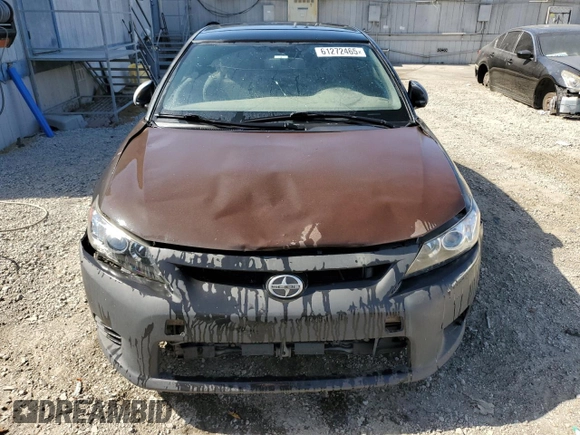 2012 Scion tC z VIN JTKJF5C70C3034928, wystawiony jako Copart lot #61272465 z przebiegiem 183 054 mil mil oraz Szkoda całkowita • Salvage title. Historia ofert i sprzedaży dostępna na DreamBid. Obrazek 5.