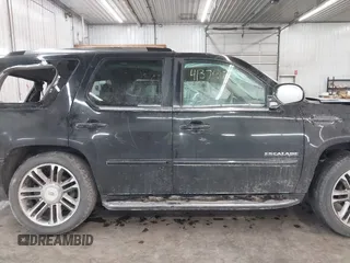 2012 Cadillac Escalade Premium z VIN 1GYS4CEF7CR299766, wystawiony jako IAAI lot #41374795 z przebiegiem 156 491 mil mil oraz . Historia ofert i sprzedaży dostępna na DreamBid. Obrazek 14.