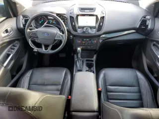 2017 Ford Escape Titanium with VIN 1FMCU0JD2HUB21261, listed as a Copart auction lot 76607264 with 130,796 mi miles and Salvage Title. Bid and sale history available at carsss.com. Image 8.