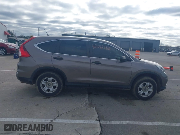 2015 Honda CR-V LX with VIN 5J6RM4H35FL127992, listed as a IAAI auction lot 42042332 with 141,642 mi miles and . Bid and sale history available at DreamBid. Image 13.