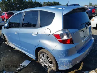2009 Honda Fit Sport with VIN JHMGE88409S044540, listed as a IAAI auction lot 41933396 with 218,346 mi miles. Bid and sale history available at carsss.com. Image 3.